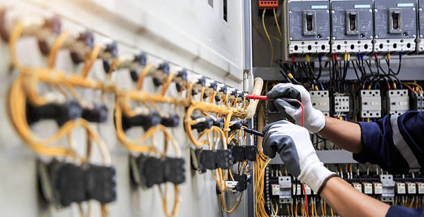 Professional Emergency Electrician technician working in Madison County County, ID
